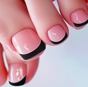 Macro shot of glossy pink press-on toenails with classic black French tips style