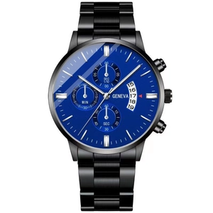 Detailed close-up of blue quartz watch dial with chronograph sub-dials and date window