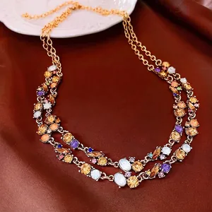 French court style double layer necklace with colorful crystals on satin backdrop