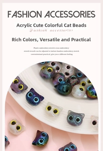 Macro detail of acrylic cat head beads in various pearl colors on a ceramic plate