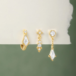 Three-piece gold S925 silver earring set with geometric zircon tassels and petal details