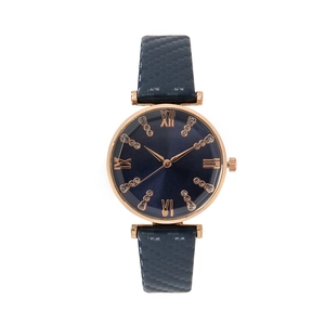 Women's rose gold watch with deep blue diamond dial and textured honeycomb strap