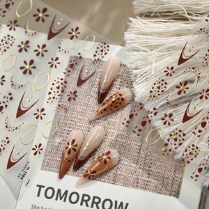 Leopard print and gold foil nail stickers with chic bohemian patterns and floral motifs