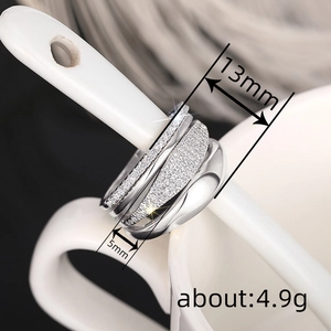 Stackable silver ring set with cubic zirconia stones featuring wave lines and 13mm width