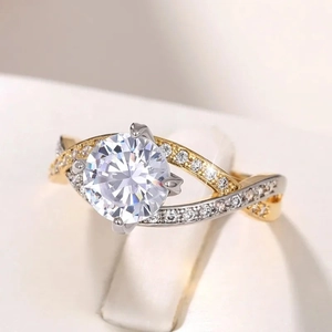 Macro shot of two-tone four-prong solitaire ring with criss-cross pave set diamond-like bands