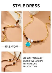 Detailed close-up of tiger eye stone beads and stainless steel heart pendant on the bracelet