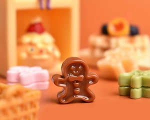 Macro shot of miniature resin gingerbread man figurine for dollhouse DIY crafts