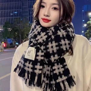 Winter checkered mohair scarf in black and beige plaid featuring stylish fringe details