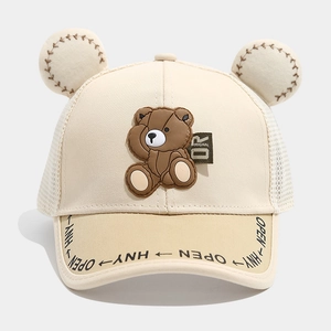Close-up of kids mesh baseball cap with plush bear ears and breathable net texture