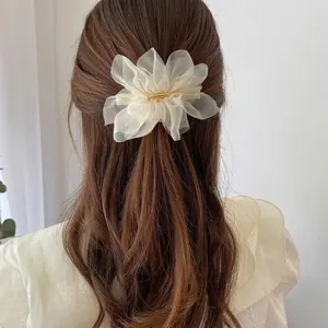 Elegant ivory chiffon flower hair clip for women with multi-layered organza petals