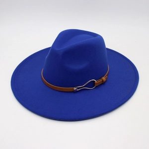 Detail of royal blue felt fedora hat featuring a brown leather belt with golden buckle