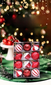 Detail of red and white Christmas ornaments including glitter balls and cupcake shapes