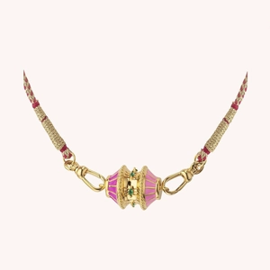 Pink enamel cylinder pendant necklace with gold woven cord and 18K gold plated clasp
