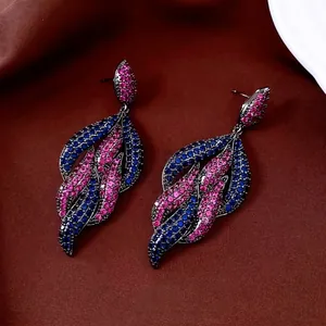 Vintage style leaf dangle earrings with blue and rose red zircons on black metal finish