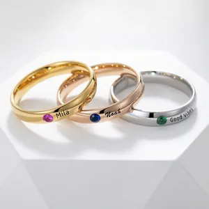 Customized stainless steel rings with birthstones and engraved names in three colors