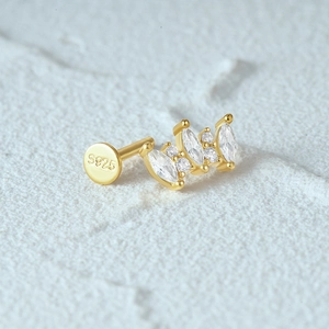 Detailed view of S925 sterling silver moon cartilage stud with clear gemstone