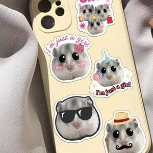 Close-up of cute hamster meme stickers with I'm just a girl slogan on a phone case