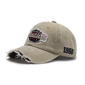 Distressed khaki cotton baseball cap with 1968 embroidery and vintage patch detail