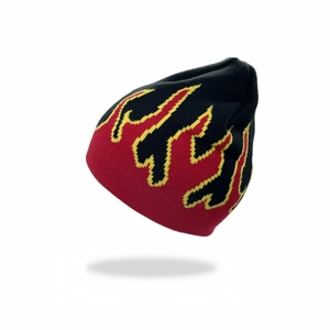 Detailed view of the jacquard fire pattern on a black and red knitted beanie hat