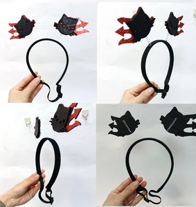 Detail of Halloween pet headband with spring-loaded glittery devil cat ears and chin strap