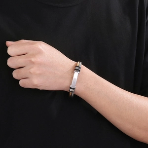 Modern twisted cable steel bracelet for men with matte finish silver bar detail