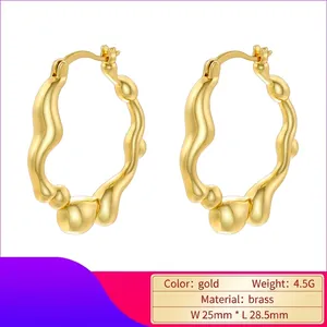 Modern irregular wave gold brass earrings with a liquid metal effect for women