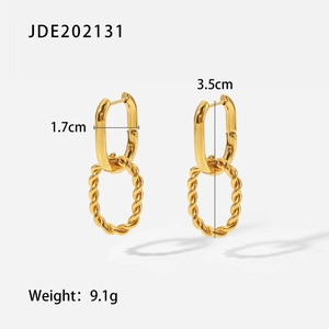 Detailed view of gold twisted rope hoop earrings with 3.5cm length and size dimensions