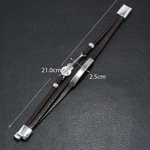 Detail of multi-layer brown leather bracelet with guitar charm and dimension markings