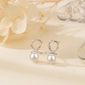 Elegant S925 silver pearl stud earrings featuring a minimalist twisted line design