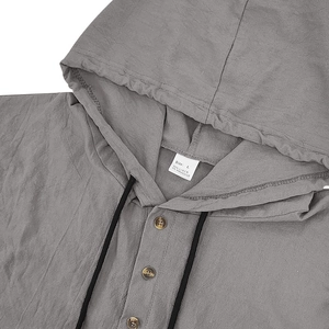 Detail shot of grey linen shirt fabric texture and size L neck label specification