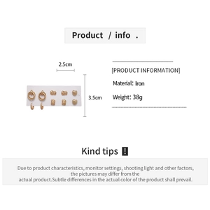 Detail showing 5 pairs of gold textured heart earrings with material and weight specs