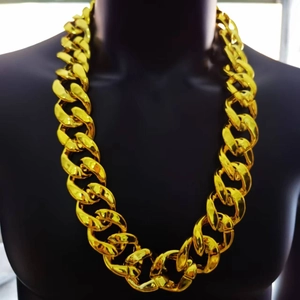 Thick chunky gold cuban link necklace for hip hop style on black display mannequin