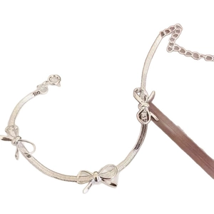 Silver bow snake chain bracelet with adjustable extension for women daily wear