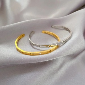 Minimalist Roman numeral titanium steel bangle with rhinestone in gold and silver finish