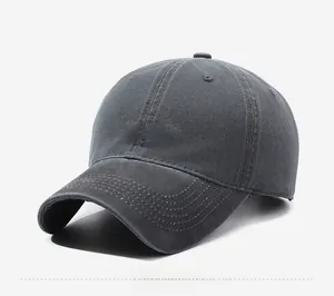 Detail view of vintage grey baseball cap with COYENRAT embroidery and washed cotton texture