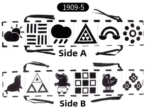 Detailed view of double-sided black and white high contrast baby crib book with animal patterns