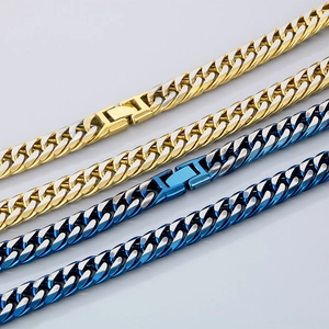 Détails de chaînes à mailles cubaines bicolores avec fermoirs en finitions or et bleu