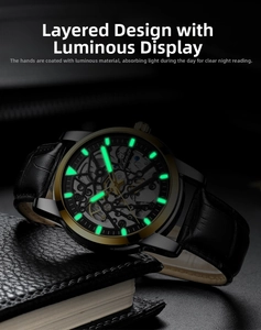 Macro shot of luminous green watch hands and hollow mechanical dial with black leather strap
