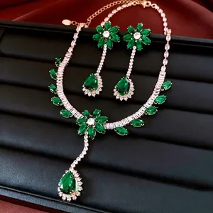 Elegant vintage jewelry set with emerald zircon flower pendant necklace and drop earrings