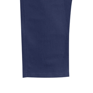 Detail of dark blue linen trousers showing double-stitched hem and natural fabric texture