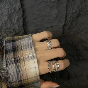 Irregular lava texture layered open ring set with minimalist silver metallic finish