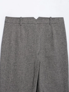 Detail of grey twill trousers waist showing belt loops and V-cut back waistband design