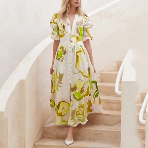 Floral print maxi dress with deep V-neck and button design for a resort beach look