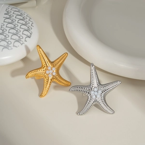 Starfish napkin rings with pearls in gold and silver finish, stainless steel luxury design