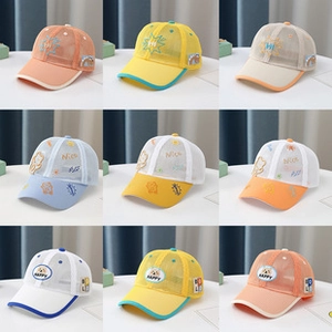 Detailed view of breathable mesh kids baseball caps with colorful cartoon embroidery