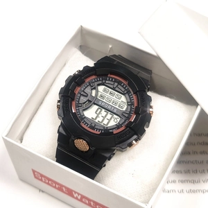 Digital sports watch in black and rose gold with LCD display in a white gift box