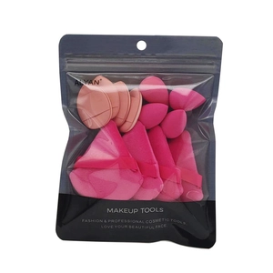 Set da 12 spugnette trucco rosa in varie forme in una busta trasparente professionale