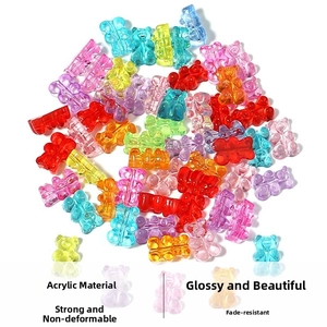 Macro shot of colorful transparent acrylic gummy bear beads for DIY jewelry making