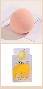 Detailed view of pink teardrop and yellow lemon-shaped soft makeup sponges in packaging