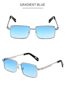 Detail view of square frame sunglasses with gradient blue lenses and silver metal temples